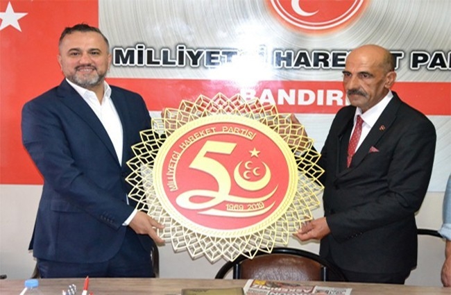 AK Parti’den MHP’ye 50’nci yıl ziyareti