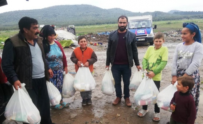 Almanya’dan Ayvalık ve Burhaniye’de barakalarda yaşayanlara şefkatli destek