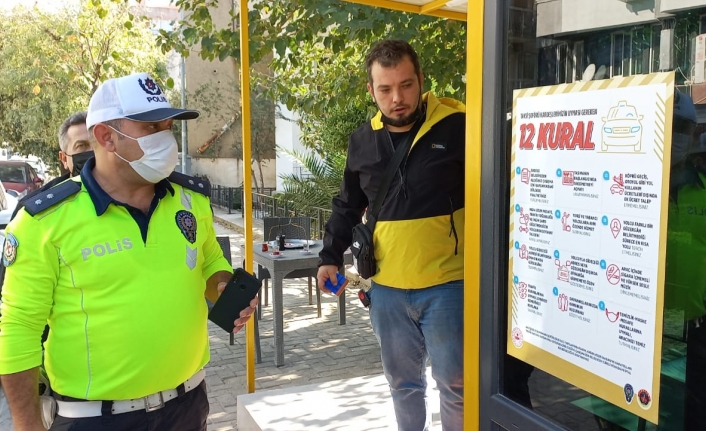 Taksi şoförüne '12 Kural' afişleri asıldı  