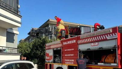 Ayvalık’ta 3 katlı evde yangın paniği