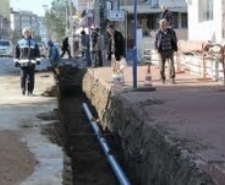 BURHANİYE’DE CADDELER SULAR İÇİNDE KALMAYACAK