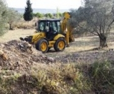 AYVALIKTA DERE ISLAHI SIRASINDA SİLAH VE MÜHİMMATLAR BULUNDU