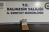 Edremit'te şüphe üzerine durdurulan kişinin üzerinden sentetik hap ele geçirildi