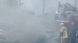Edremit Güre'de karayolunu duman altında bırakan araç yangını Balıkesir